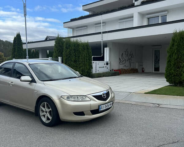 Желтый Мазда 6, объемом двигателя 1.99 л и пробегом 284 тыс. км за 4400 $, фото 1 на Automoto.ua