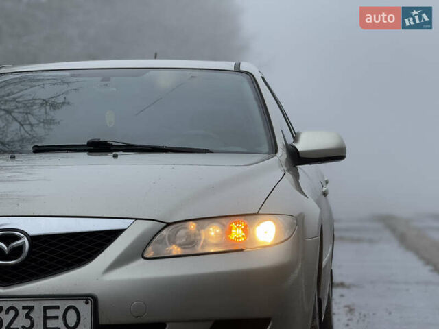 Желтый Мазда 6, объемом двигателя 2 л и пробегом 260 тыс. км за 3350 $, фото 7 на Automoto.ua