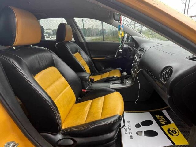 Жовтий Мазда 6, об'ємом двигуна 2 л та пробігом 303 тис. км за 3999 $, фото 20 на Automoto.ua