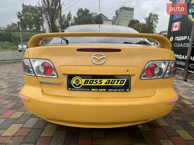 Жовтий Мазда 6, об'ємом двигуна 2 л та пробігом 303 тис. км за 3999 $, фото 4 на Automoto.ua
