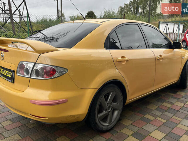 Жовтий Мазда 6, об'ємом двигуна 2 л та пробігом 303 тис. км за 3999 $, фото 5 на Automoto.ua