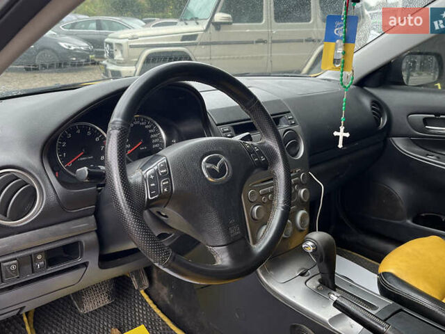 Жовтий Мазда 6, об'ємом двигуна 2 л та пробігом 303 тис. км за 3999 $, фото 9 на Automoto.ua