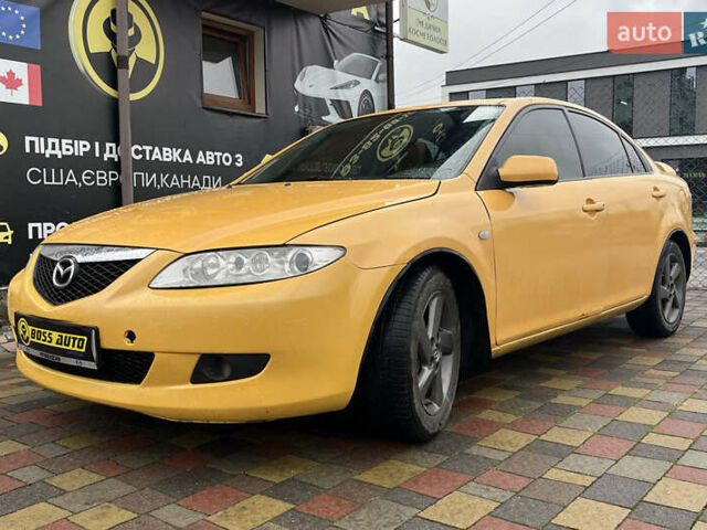 Жовтий Мазда 6, об'ємом двигуна 2 л та пробігом 303 тис. км за 3999 $, фото 2 на Automoto.ua