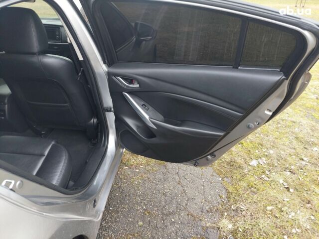 Серый Мазда 6, объемом двигателя 2.5 л и пробегом 175 тыс. км за 12500 $, фото 17 на Automoto.ua