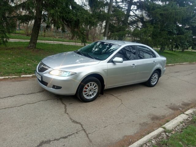 Серый Мазда 6, объемом двигателя 2 л и пробегом 259 тыс. км за 3500 $, фото 1 на Automoto.ua