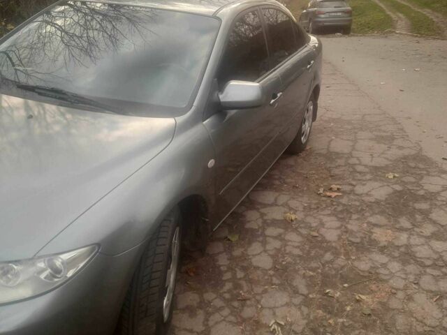 Серый Мазда 6, объемом двигателя 2 л и пробегом 313 тыс. км за 4000 $, фото 3 на Automoto.ua