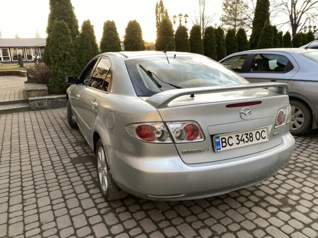 Серый Мазда 6, объемом двигателя 2 л и пробегом 300 тыс. км за 2350 $, фото 2 на Automoto.ua