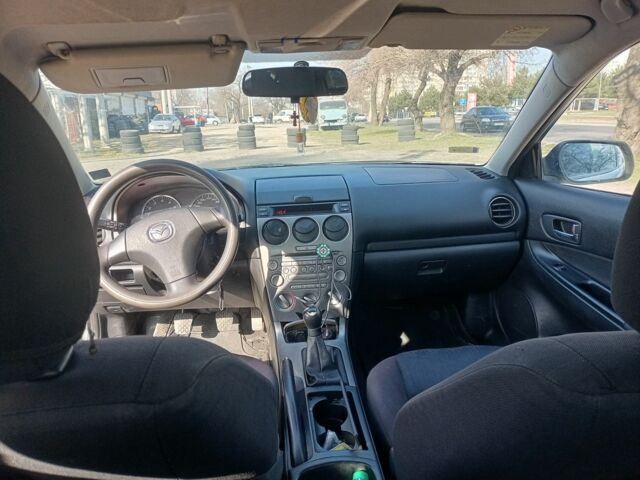 Серый Мазда 6, объемом двигателя 1.8 л и пробегом 345 тыс. км за 2750 $, фото 2 на Automoto.ua