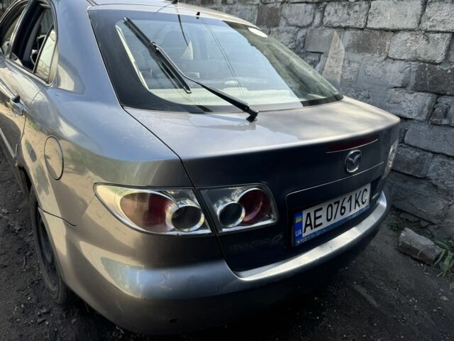 Серый Мазда 6, объемом двигателя 2 л и пробегом 300 тыс. км за 1900 $, фото 3 на Automoto.ua