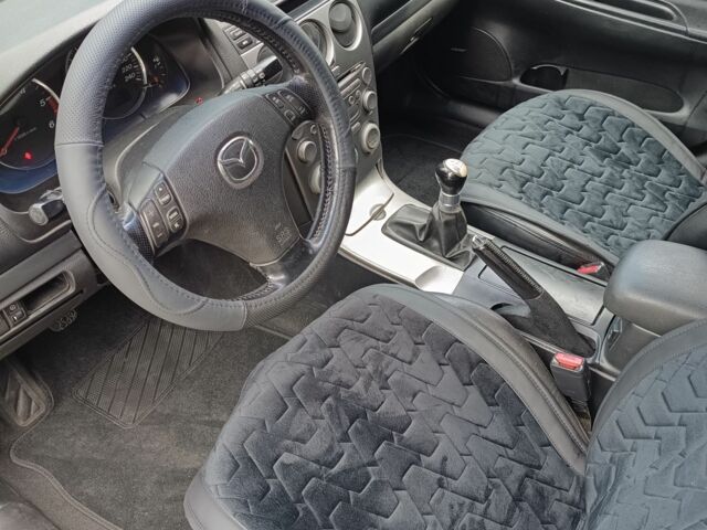 Серый Мазда 6, объемом двигателя 2 л и пробегом 387 тыс. км за 2800 $, фото 1 на Automoto.ua
