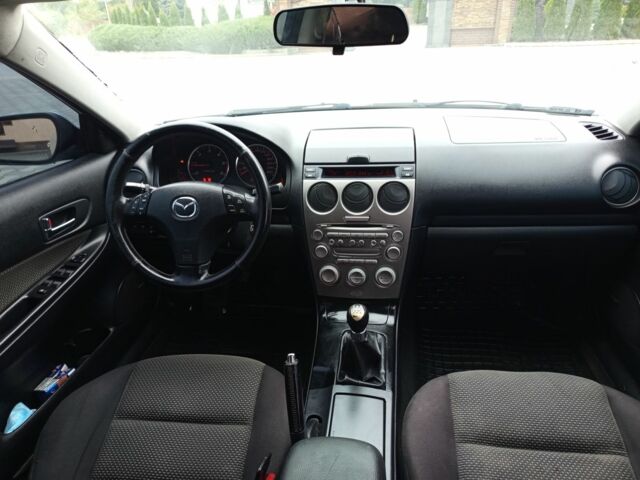 Серый Мазда 6, объемом двигателя 2 л и пробегом 250 тыс. км за 3550 $, фото 4 на Automoto.ua