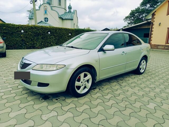 Серый Мазда 6, объемом двигателя 2 л и пробегом 250 тыс. км за 3550 $, фото 1 на Automoto.ua