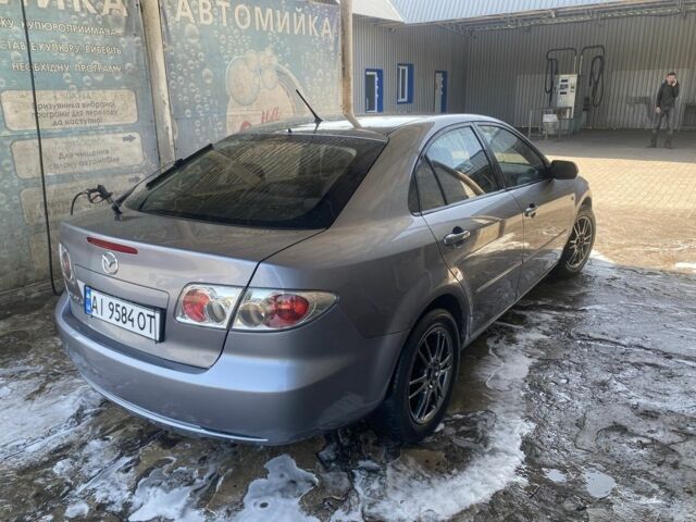 Серый Мазда 6, объемом двигателя 2 л и пробегом 314 тыс. км за 4000 $, фото 2 на Automoto.ua