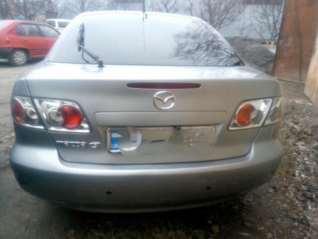 Серый Мазда 6, объемом двигателя 2 л и пробегом 178 тыс. км за 4800 $, фото 1 на Automoto.ua