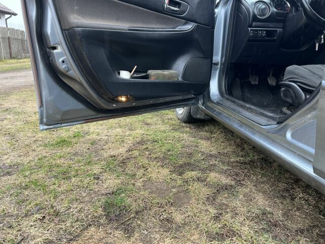 Серый Мазда 6, объемом двигателя 1.8 л и пробегом 425 тыс. км за 4250 $, фото 7 на Automoto.ua