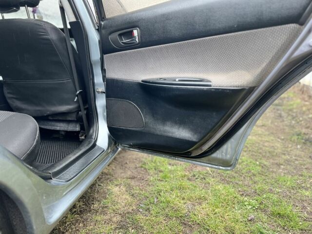 Серый Мазда 6, объемом двигателя 1.8 л и пробегом 425 тыс. км за 4250 $, фото 9 на Automoto.ua