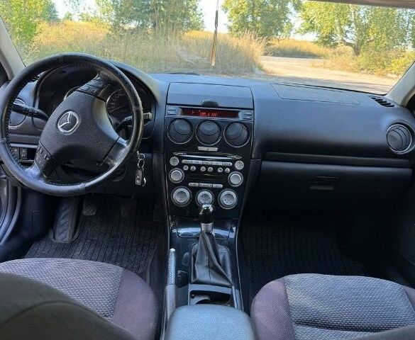Серый Мазда 6, объемом двигателя 2 л и пробегом 380 тыс. км за 3850 $, фото 3 на Automoto.ua