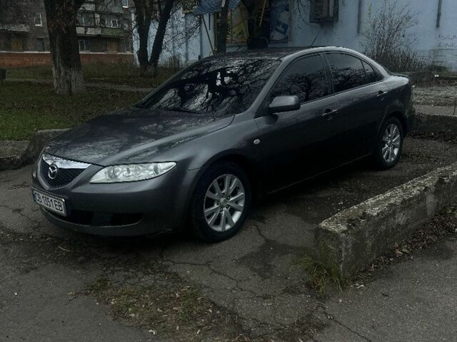 Серый Мазда 6, объемом двигателя 2 л и пробегом 380 тыс. км за 3850 $, фото 1 на Automoto.ua
