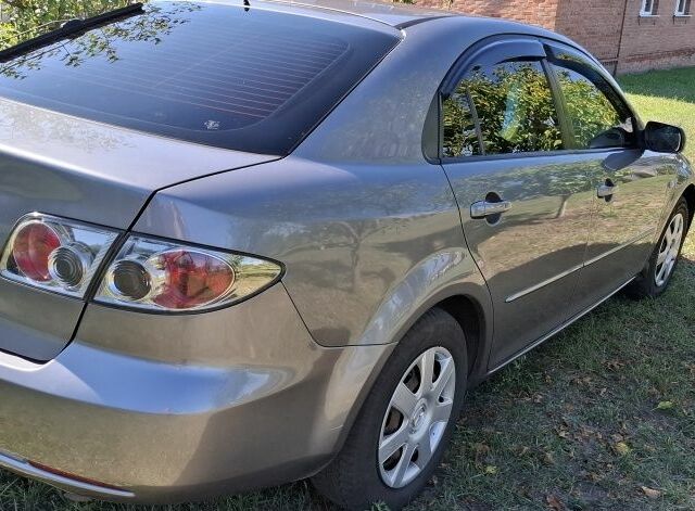 Серый Мазда 6, объемом двигателя 2 л и пробегом 200 тыс. км за 3500 $, фото 2 на Automoto.ua
