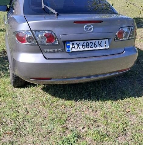 Серый Мазда 6, объемом двигателя 2 л и пробегом 200 тыс. км за 3500 $, фото 3 на Automoto.ua