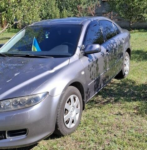 Серый Мазда 6, объемом двигателя 2 л и пробегом 200 тыс. км за 3500 $, фото 1 на Automoto.ua
