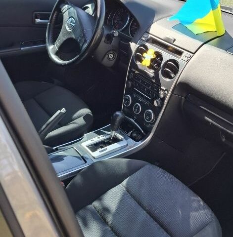 Серый Мазда 6, объемом двигателя 2 л и пробегом 200 тыс. км за 3500 $, фото 4 на Automoto.ua