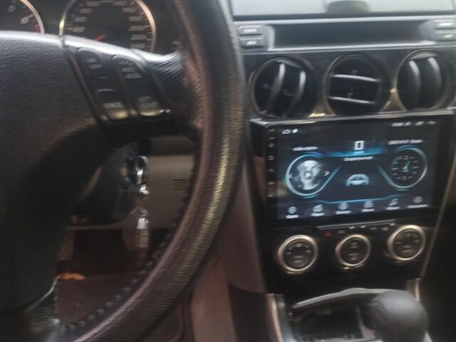 Серый Мазда 6, объемом двигателя 1.8 л и пробегом 35 тыс. км за 3500 $, фото 1 на Automoto.ua