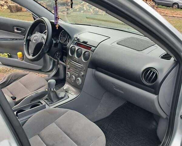 Серый Мазда 6, объемом двигателя 2 л и пробегом 288 тыс. км за 3500 $, фото 2 на Automoto.ua
