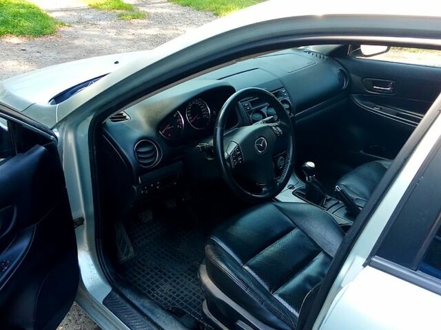 Серый Мазда 6, объемом двигателя 2 л и пробегом 260 тыс. км за 3000 $, фото 1 на Automoto.ua