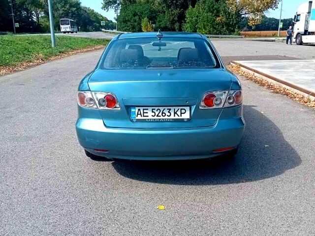 Серый Мазда 6, объемом двигателя 2.3 л и пробегом 300 тыс. км за 3500 $, фото 2 на Automoto.ua