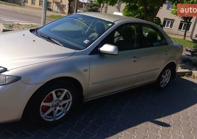 Серый Мазда 6, объемом двигателя 2 л и пробегом 204 тыс. км за 3200 $, фото 27 на Automoto.ua