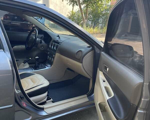 Сірий Мазда 6, об'ємом двигуна 1.8 л та пробігом 262 тис. км за 5500 $, фото 2 на Automoto.ua