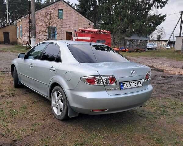 Серый Мазда 6, объемом двигателя 2 л и пробегом 288 тыс. км за 3500 $, фото 4 на Automoto.ua