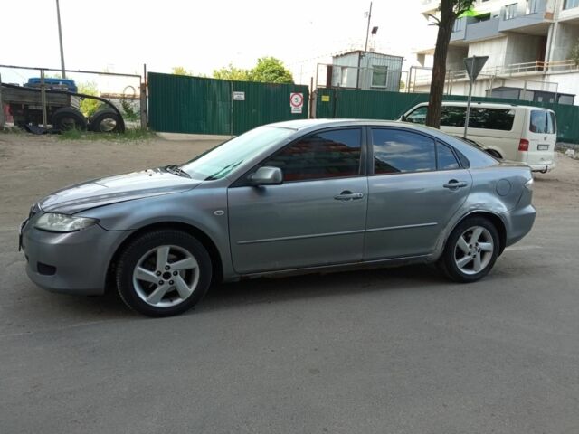 Серый Мазда 6, объемом двигателя 2 л и пробегом 200 тыс. км за 3899 $, фото 3 на Automoto.ua
