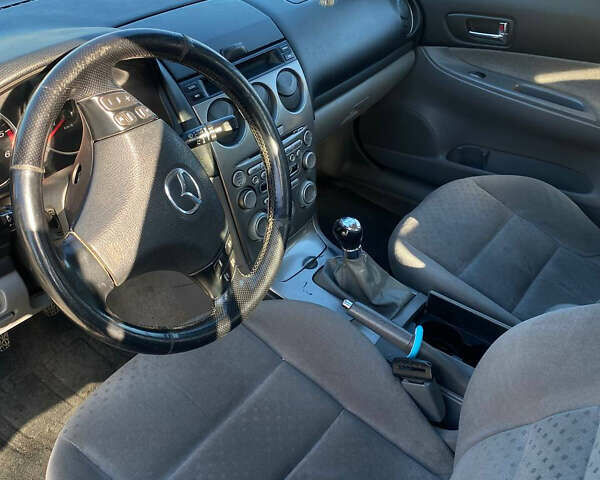 Серый Мазда 6, объемом двигателя 2 л и пробегом 225 тыс. км за 3499 $, фото 7 на Automoto.ua