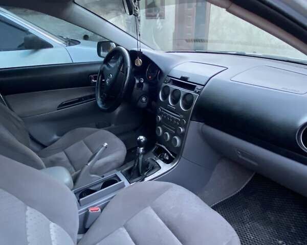 Серый Мазда 6, объемом двигателя 2 л и пробегом 250 тыс. км за 3600 $, фото 2 на Automoto.ua