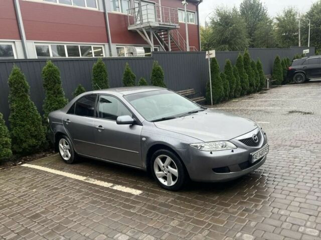 Серый Мазда 6, объемом двигателя 2 л и пробегом 306 тыс. км за 4900 $, фото 2 на Automoto.ua