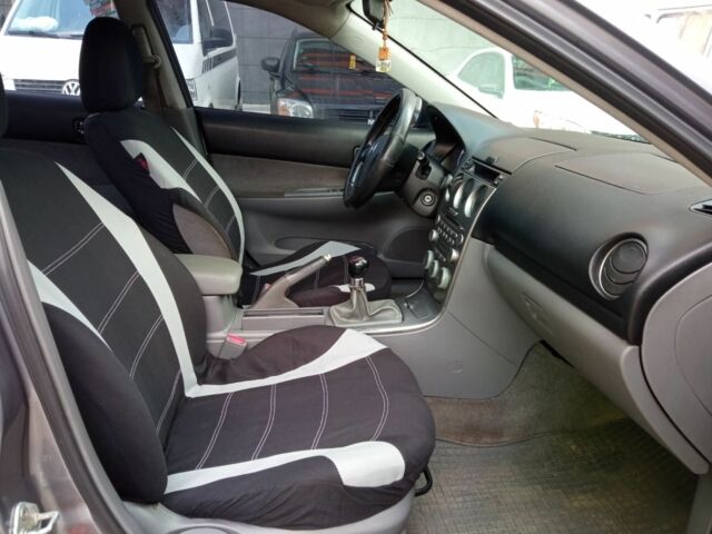 Серый Мазда 6, объемом двигателя 2 л и пробегом 200 тыс. км за 3899 $, фото 4 на Automoto.ua