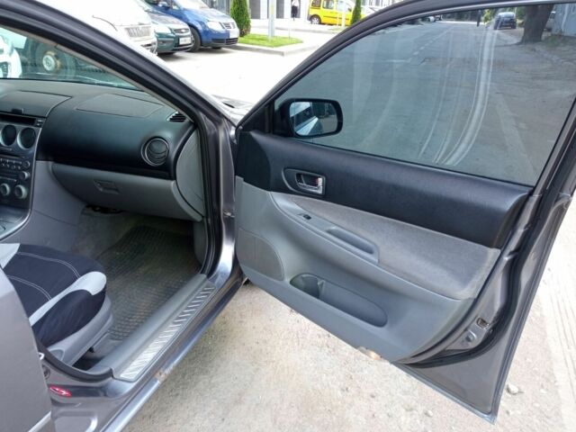 Серый Мазда 6, объемом двигателя 2 л и пробегом 200 тыс. км за 3899 $, фото 11 на Automoto.ua