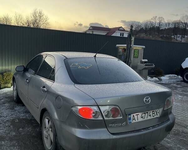 Серый Мазда 6, объемом двигателя 1.8 л и пробегом 372 тыс. км за 3750 $, фото 1 на Automoto.ua