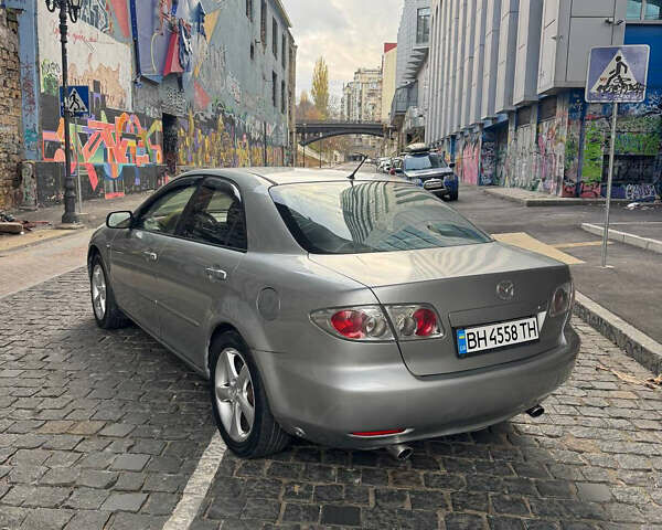 Серый Мазда 6, объемом двигателя 2.3 л и пробегом 230 тыс. км за 2650 $, фото 5 на Automoto.ua
