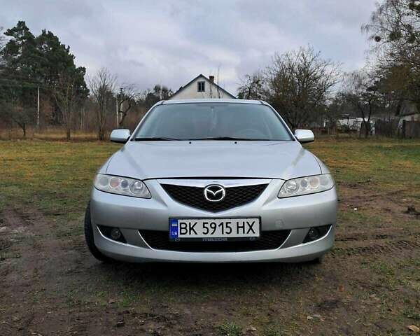 Серый Мазда 6, объемом двигателя 2 л и пробегом 288 тыс. км за 3500 $, фото 5 на Automoto.ua