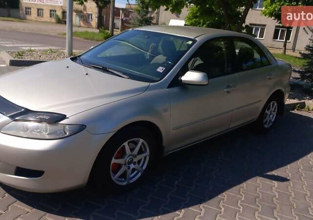 Серый Мазда 6, объемом двигателя 2 л и пробегом 204 тыс. км за 3200 $, фото 26 на Automoto.ua