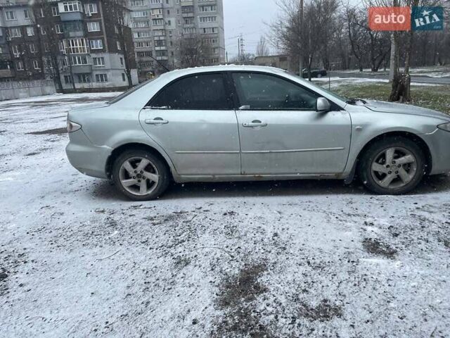 Сірий Мазда 6, об'ємом двигуна 1.8 л та пробігом 315 тис. км за 2600 $, фото 1 на Automoto.ua