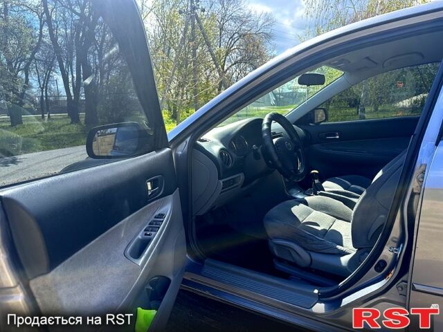 Серый Мазда 6, объемом двигателя 1.8 л и пробегом 366 тыс. км за 3800 $, фото 6 на Automoto.ua
