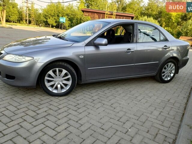 Сірий Мазда 6, об'ємом двигуна 2 л та пробігом 371 тис. км за 3750 $, фото 2 на Automoto.ua
