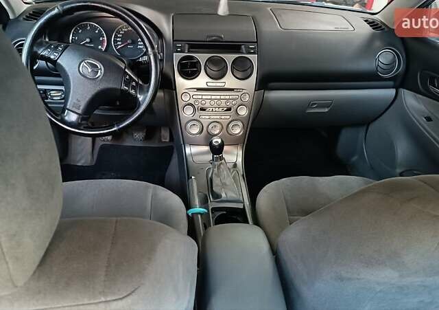 Серый Мазда 6, объемом двигателя 2 л и пробегом 204 тыс. км за 3200 $, фото 16 на Automoto.ua