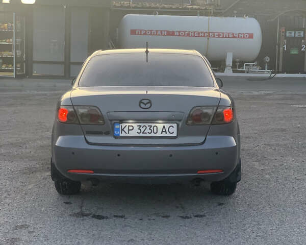 Серый Мазда 6, объемом двигателя 2 л и пробегом 310 тыс. км за 3500 $, фото 3 на Automoto.ua
