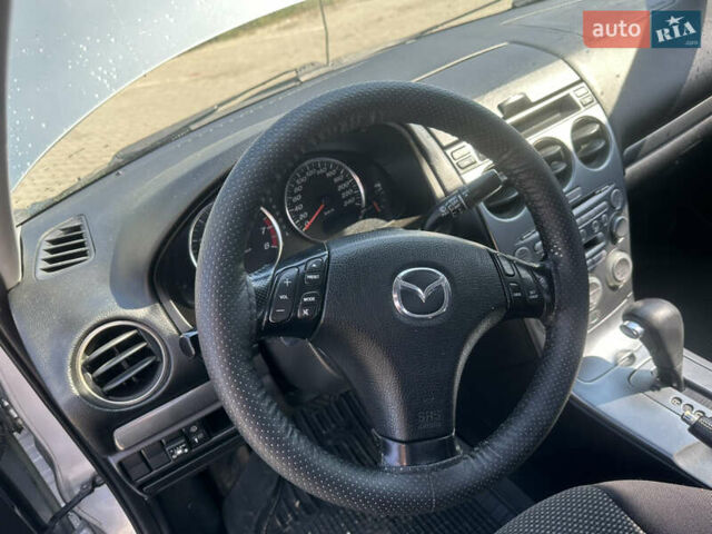 Серый Мазда 6, объемом двигателя 2 л и пробегом 312 тыс. км за 3550 $, фото 1 на Automoto.ua