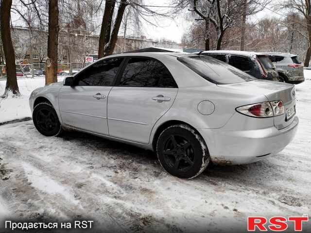 Серый Мазда 6, объемом двигателя 2 л и пробегом 218 тыс. км за 4000 $, фото 2 на Automoto.ua